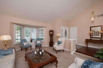 Living Room with view out to the front yard, new c