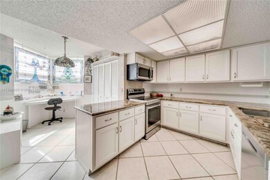 This light bright kitchen and bistro area only found in corner units.