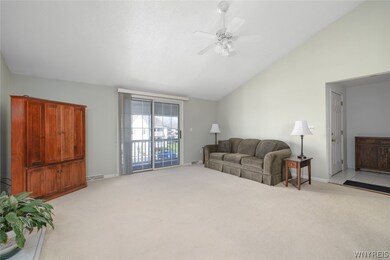 LIVING ROOM ACCESS TO COVERED BALCONY