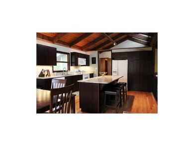 Updated kitchen with granite, HW floors and unique