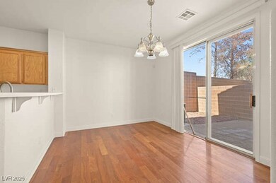 Dining area with baseboards, wood floors