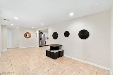 The main living space is open for dining a living