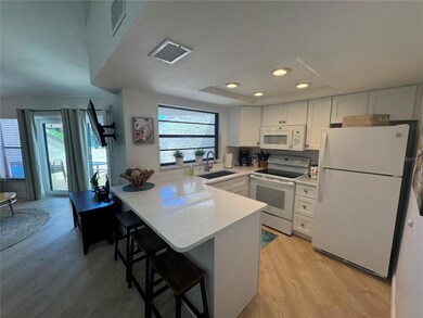 2571 Cyprus Dr unit 1-202, Palm Harbor, FL 34684 - photo 4