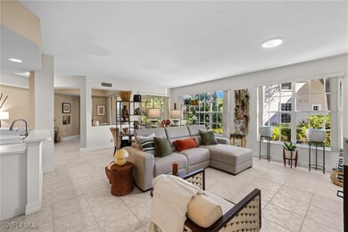 Living area with light tile patterned flooring and