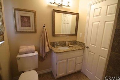 Hallway Restroom Room with Granite and Travertine 