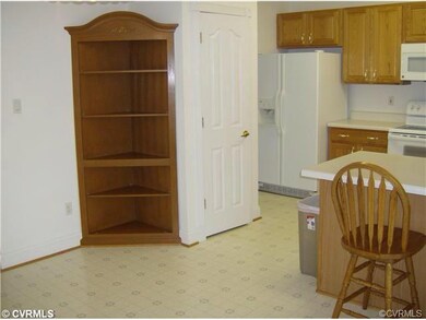 Dining area side of kitchen showing built in corne