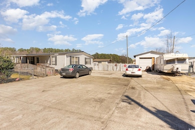 Manufactured / mobile home featuring an outdoor st