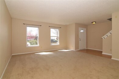 Family room has newer carpet, new blinds and open 