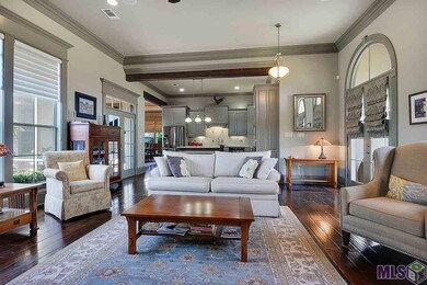 Open floor plan with beautiful beams on the ceilin
