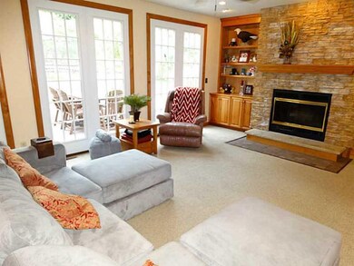 Family Room. Large windows filter in plenty of lig