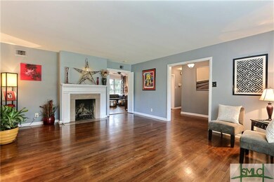 LIVING ROOM WITH FIRPLACE. OPENS TO DINING AND FAM