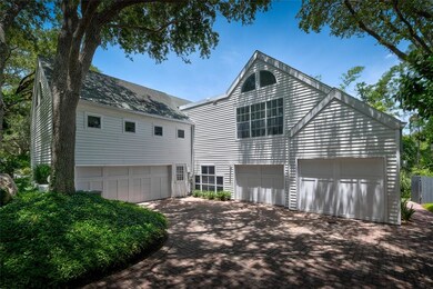 separate garages can accommodate up to 5 cars, one