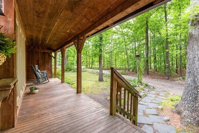 28X6 side covered porch view to the unpaved drivew