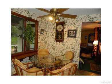 Kitchen Dining. Large window with view of the back