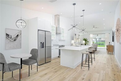 Kitchen with white cabinets, modern cabinets, wall