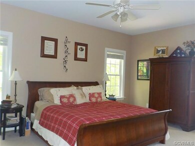 Large First Floor Master Bedroom with Ceiling Fan 