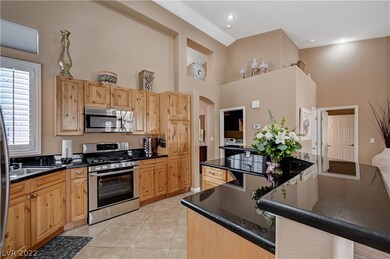UPGRADED S/S APPLIANCES & CABINETS W/ ROLL-OUTS.