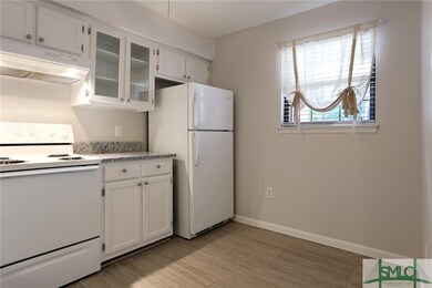 Kitchen cabinets just painted. New granite counter