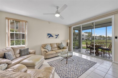 Tiled living area featuring healthy amount of natu