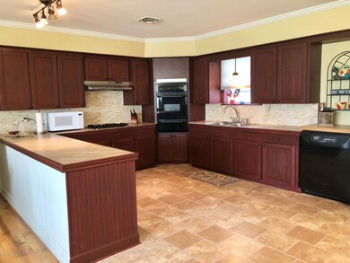 1412 W 8th St. Kaplan