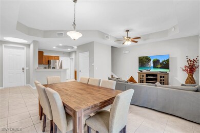 Dining space with light tile patterned floors, cei