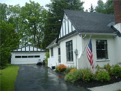 Exterior Front. Side view of home, garage, drive, 