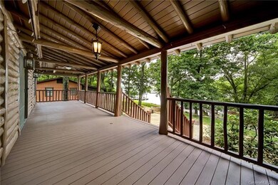 Large porch overlooking the lake. Watch the beauti