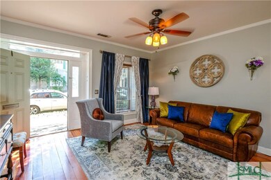 Living room opened to Tattnall Street.