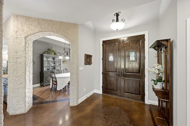 Entryway featuring concrete flooring