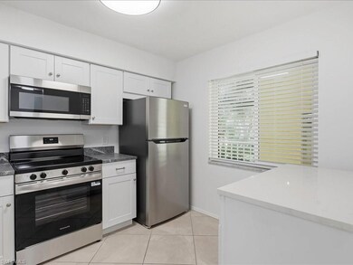 1001 Foxfire Ln unit 204, Naples, FL 34104 - photo 2