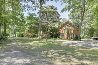 Secluded wooded lot with circular driveway