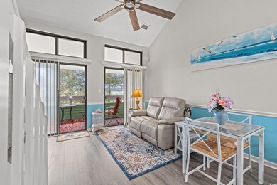 Living area with ceiling fan, hardwood / wood-styl