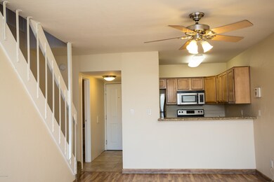Kitchen with granite breakfast bar