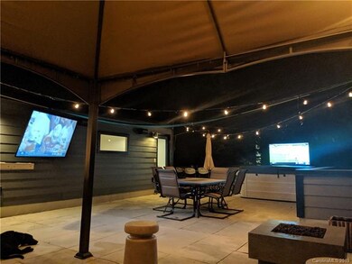 Rooftop picture shows similar unit to give buyer i
