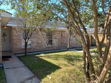 Concrete Sidewalk & Minimal Landscaping for Easy Maintenance
