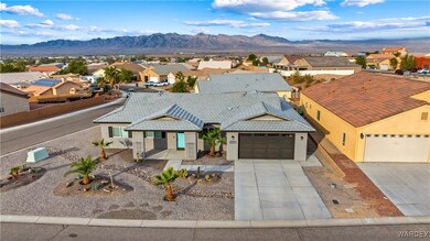 Birds eye view of property featuring a mountain vi