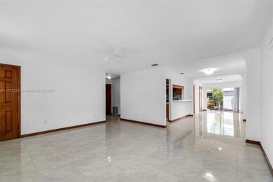 DINING ROOM, KITCHEN, & SITTING AREA BY BACK DOOR