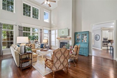 Elegant Living Room with a twenty foot ceiling.