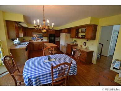 Kitchen. Island kitchen with refinished hardwood f