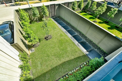 Expansive fenced front yard with over 900 square f