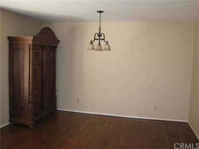 The large open space adjacent to the kitchen can b