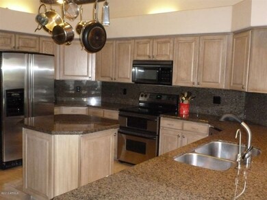 Island Kitchen with Pot Rack & Granite