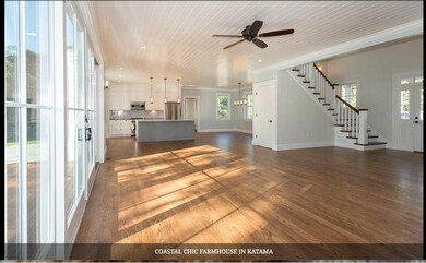 Photo of a similar home showing open floor plan