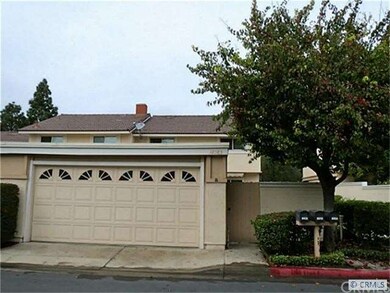 Property as viewed from private street, back entra