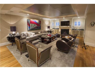 Living Room. Sleek soft deco design includes many
