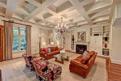 The Great Room with 12' coffered ceiling and big f