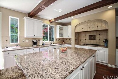 The bright white cabinets accentuate the bright ki