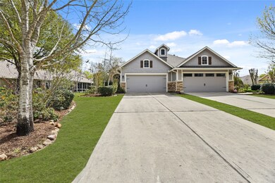 Charming duplex with spacious garages, manicured landscaping, and inviting curb appeal.