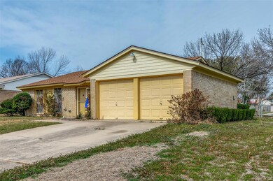 Ranch-style home featuring driveway, an attached g