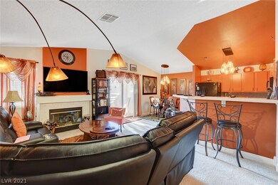 Living room has gas fireplace